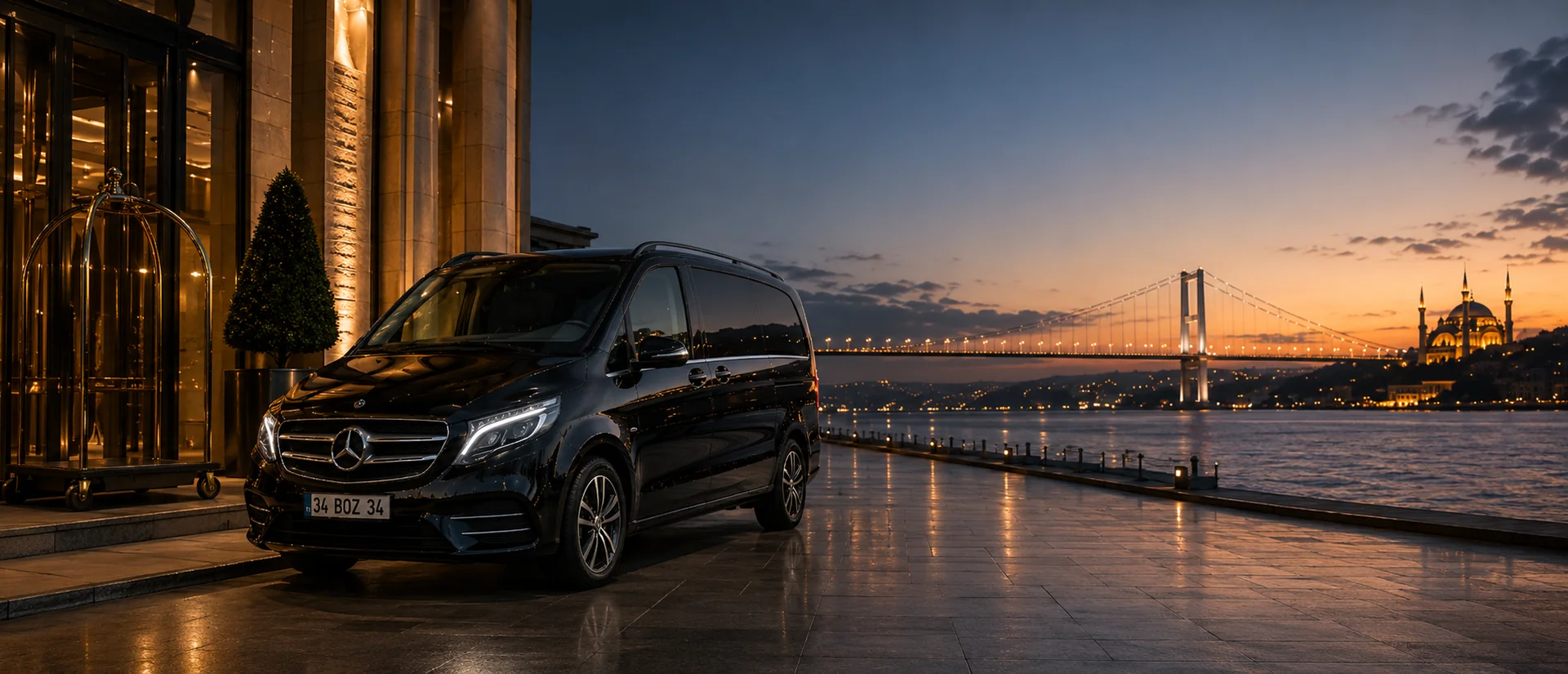 Black Mercedes V-Class VIP transfer vehicle waiting by the Bosphorus in Istanbul